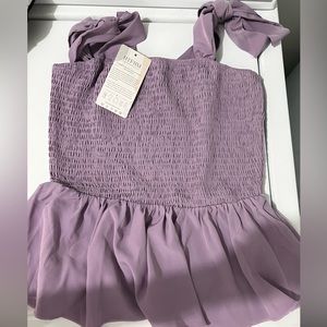 Purple tank - small but fits a small or medium- brand new